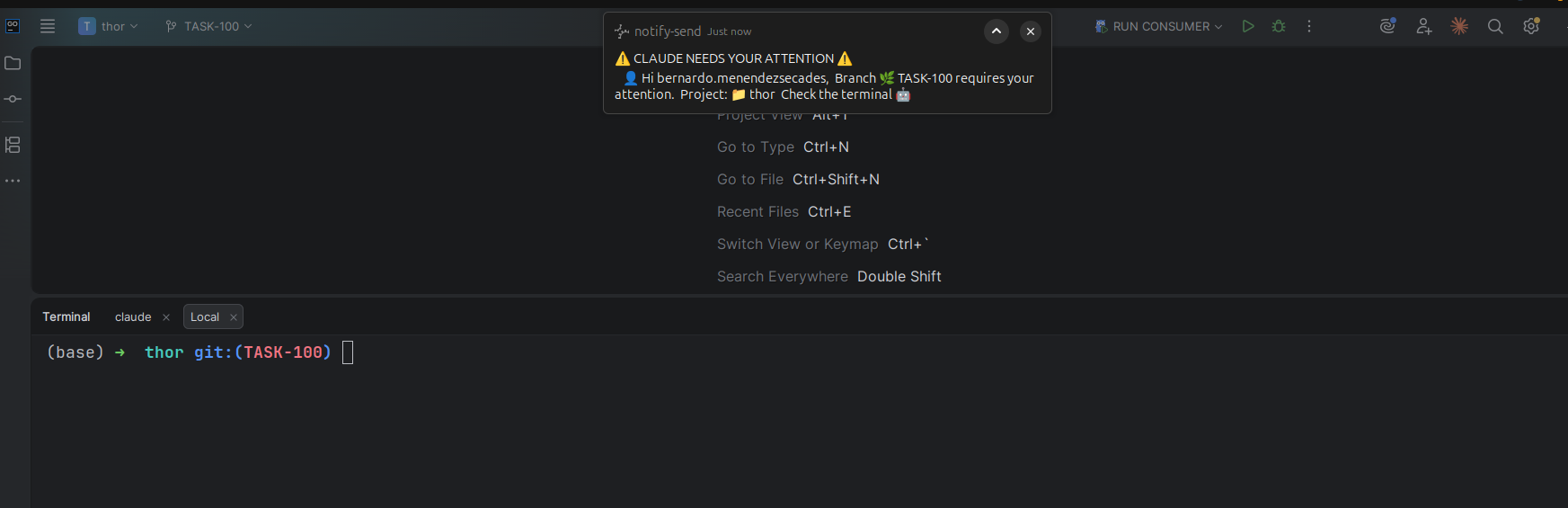 Desktop notification fired by a Claude Code Notification hook: "CLAUDE NEEDS YOUR ATTENTION", naming the user, the branch and the project